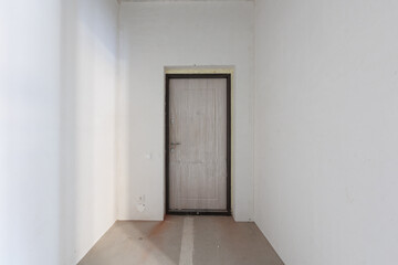 interior of the apartment without decoration in gray colors. rough finish