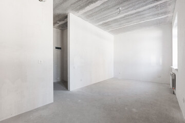 interior of the apartment without decoration in gray colors. rough finish