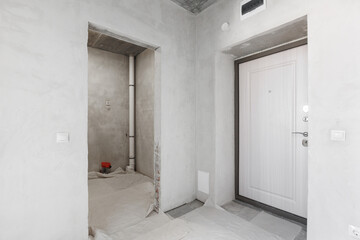 interior of the apartment without decoration in gray colors. rough finish