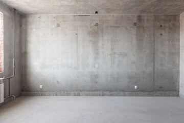 interior of the apartment without decoration in gray colors. rough finish