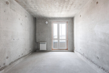 interior of the apartment without decoration in gray colors. rough finish