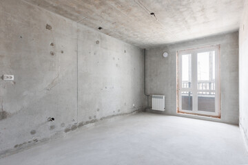 interior of the apartment without decoration in gray colors. rough finish
