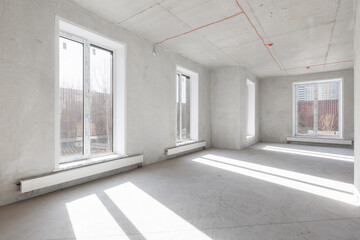 interior of the apartment without decoration in gray colors. rough finish