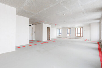 interior of the apartment without decoration in gray colors. rough finish