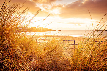sunset on Trearddur Bay Beach, Anglesey Uk