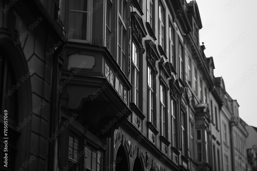 Poster a black and white photo of a clock on a building. suitable for various applications