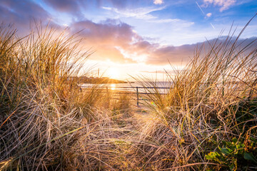 Fototapeta premium sunset on Trearddur Bay Beach, Anglesey Uk