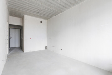 interior of the apartment without decoration in gray colors. rough finish