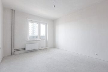 interior of the apartment without decoration in gray colors. rough finish