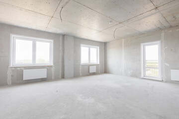 interior of the apartment without decoration in gray colors. rough finish