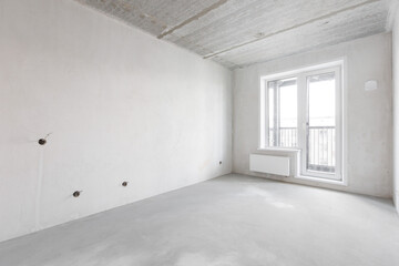 interior of the apartment without decoration in gray colors. rough finish