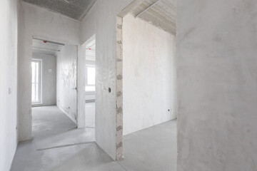interior of the apartment without decoration in gray colors. rough finish