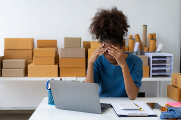 African businesswoman makes a stressed face with bad online sales idea The leading supplier of...