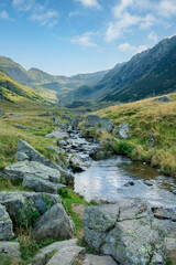 September landscape of the Fagaras Mountains, Romania. A view from the hiking trail near the Balea Lake and the Transfagarasan Road