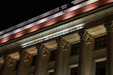 Beautifully lit buildings in Bucharest, Romania at night. Architectural light.