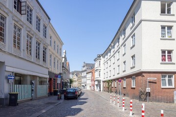 Fototapeta na wymiar Walking in Flensburg's streets along the sea side, Germany