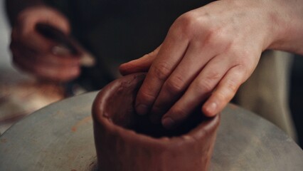 hands of a potter at work