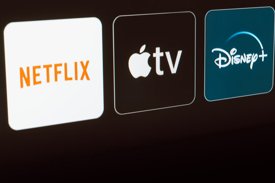 January 8, 2024, Brazil. In this photo illustration the Netflix, Apple TV and Disney Plus logo is displayed on a TV screen