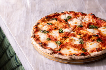 delicious cheese pizza on marble background