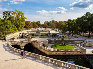 Nimes, France - october 4, 2023: Historical garden with sculptures in Nimes - Fountain garden -...