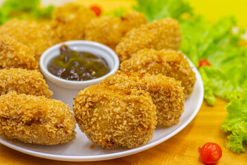 Porção de Frango Frito