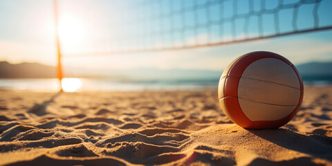 Sunlit volleyball ready for play on sandy beach grounds, with a net in the backdrop - obrazy, fototapety, plakaty