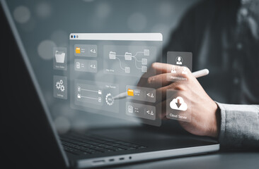 Businessman use computer laptop to manage file document on server. DMS, Cloud backup online...