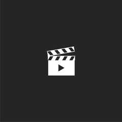 Movie clapper icon isolated on black background