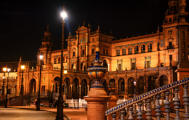 the splendid architecture in the sweet nights of Spring in Seville in Andalusia - obrazy, fototapety, plakaty