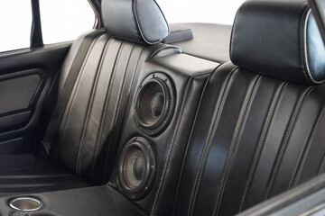 Image of car black leather back seats tuned with high performance sound system