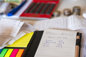 Table consist of money bills and medicine Organizer