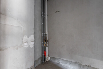 interior of the apartment without decoration in gray colors. rough finish