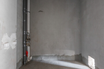 interior of the apartment without decoration in gray colors. rough finish