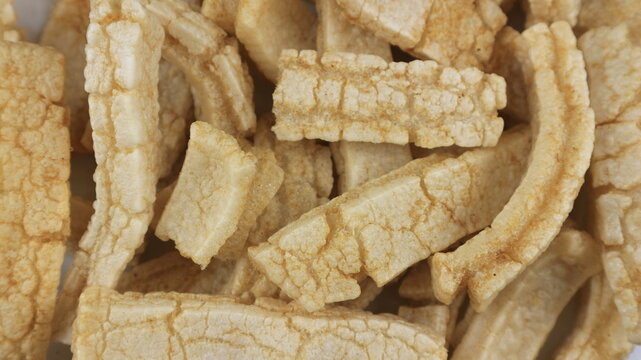 Rambak or kerupuk kulit sapi. Cow skin cracker is common side dish in Indonesia made from fried seasoned cow skin. perfect for recipe, catalog or any cooking contents.