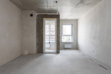 interior of the apartment without decoration in gray colors. rough finish