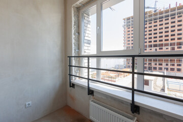 interior of the apartment without decoration in gray colors. rough finish