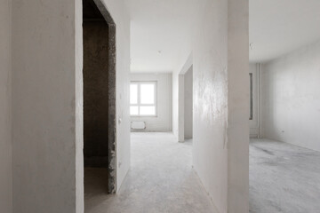 interior of the apartment without decoration in gray colors. rough finish