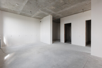 interior of the apartment without decoration in gray colors. rough finish