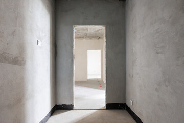 interior of the apartment without decoration in gray colors. rough finish
