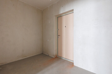 interior of the apartment without decoration in gray colors. rough finish