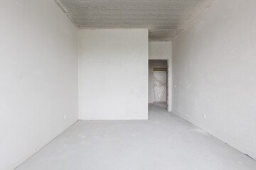interior of the apartment without decoration in gray colors. rough finish