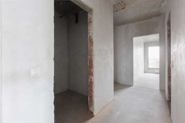 interior of the apartment without decoration in gray colors. rough finish