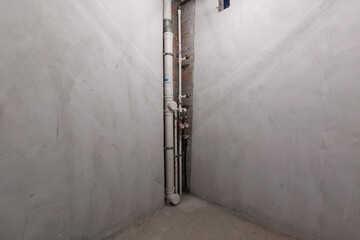 interior of the apartment without decoration in gray colors. rough finish