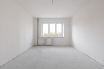 interior of the apartment without decoration in gray colors. rough finish