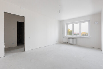 interior of the apartment without decoration in gray colors. rough finish