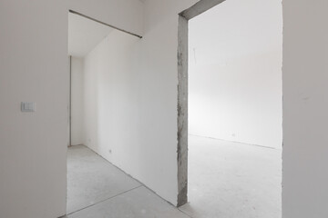 interior of the apartment without decoration in gray colors. rough finish