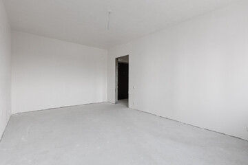 interior of the apartment without decoration in gray colors. rough finish