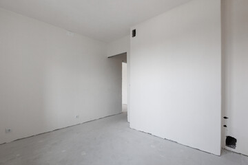 interior of the apartment without decoration in gray colors. rough finish