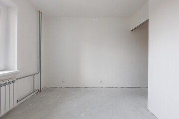 interior of the apartment without decoration in gray colors. rough finish