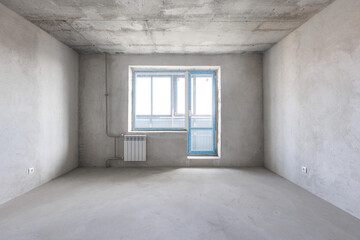 interior of the apartment without decoration in gray colors. rough finish